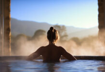 Spa pool, woman relaxing in hot tub. Generative AI